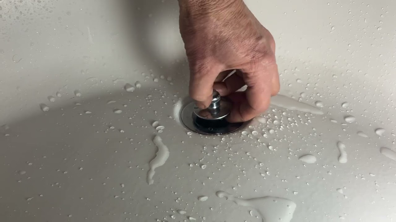 Removing a bathtub drain plug