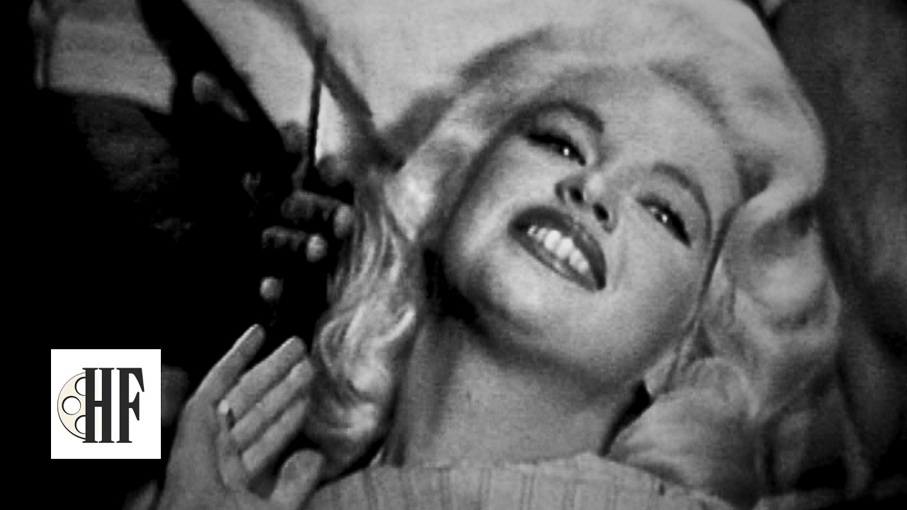 Sexy 1950s bombshell Jayne Mansfield flirts and plays fiddle