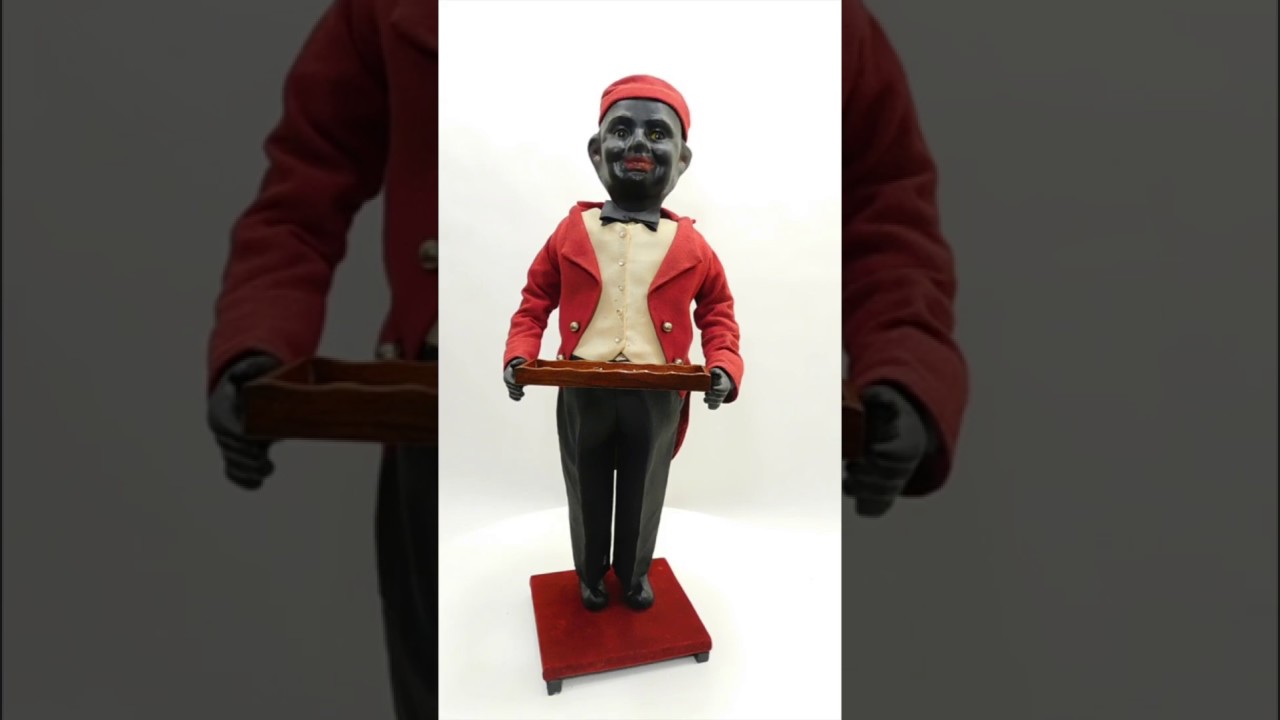 BLACK GENTLEMAN CLOCKWORK NODDER