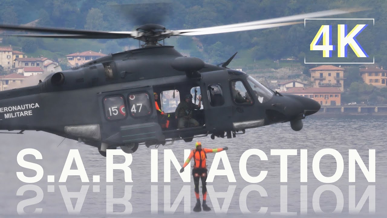 Rescue Helicopter does a Military Search and Rescue Display a Lake Water 4K