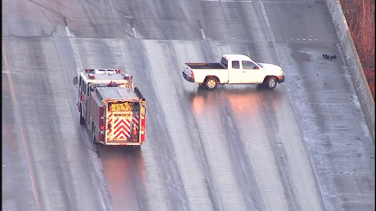 Vehicles sliding on icy Houston freeways