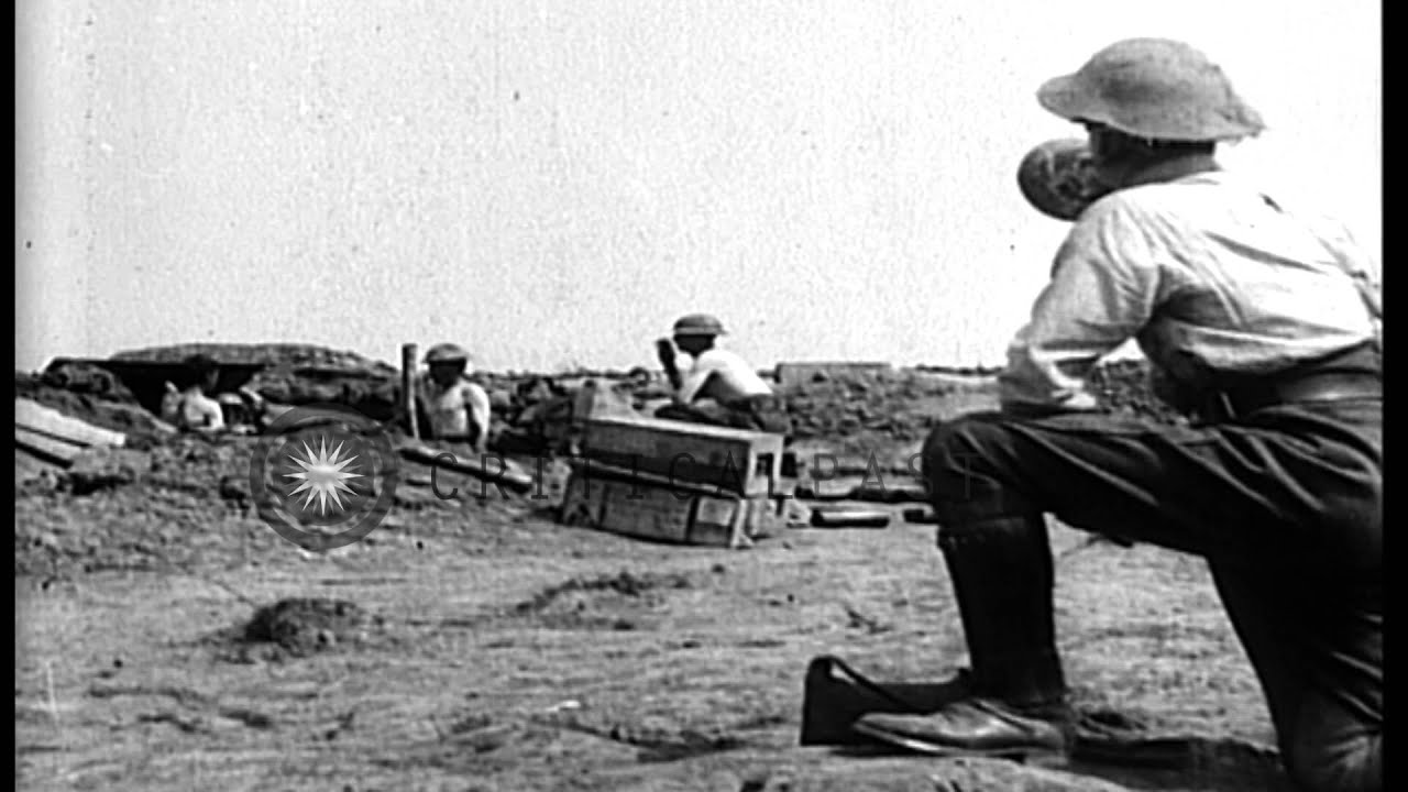 British gun crew conducts rapid fire drill with an 18 pounder artillery piece, du...HD Stock Footage