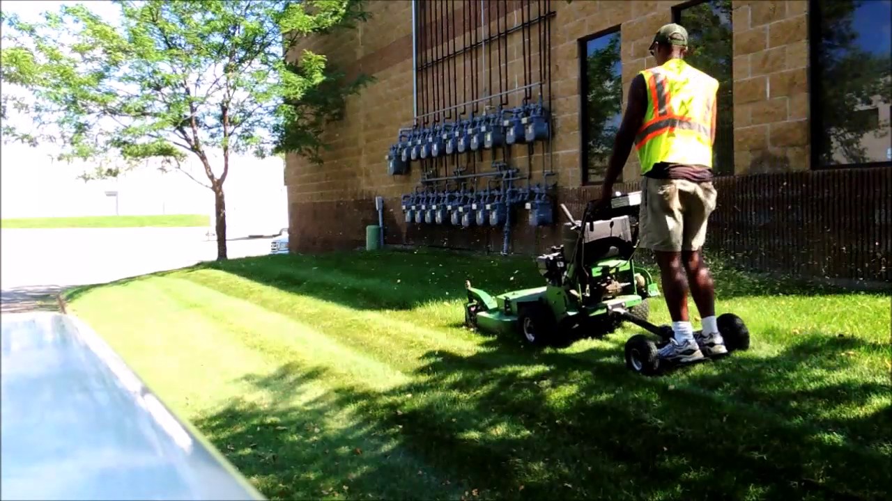 Mowing with Lesco 36 Commercial Walkbehind