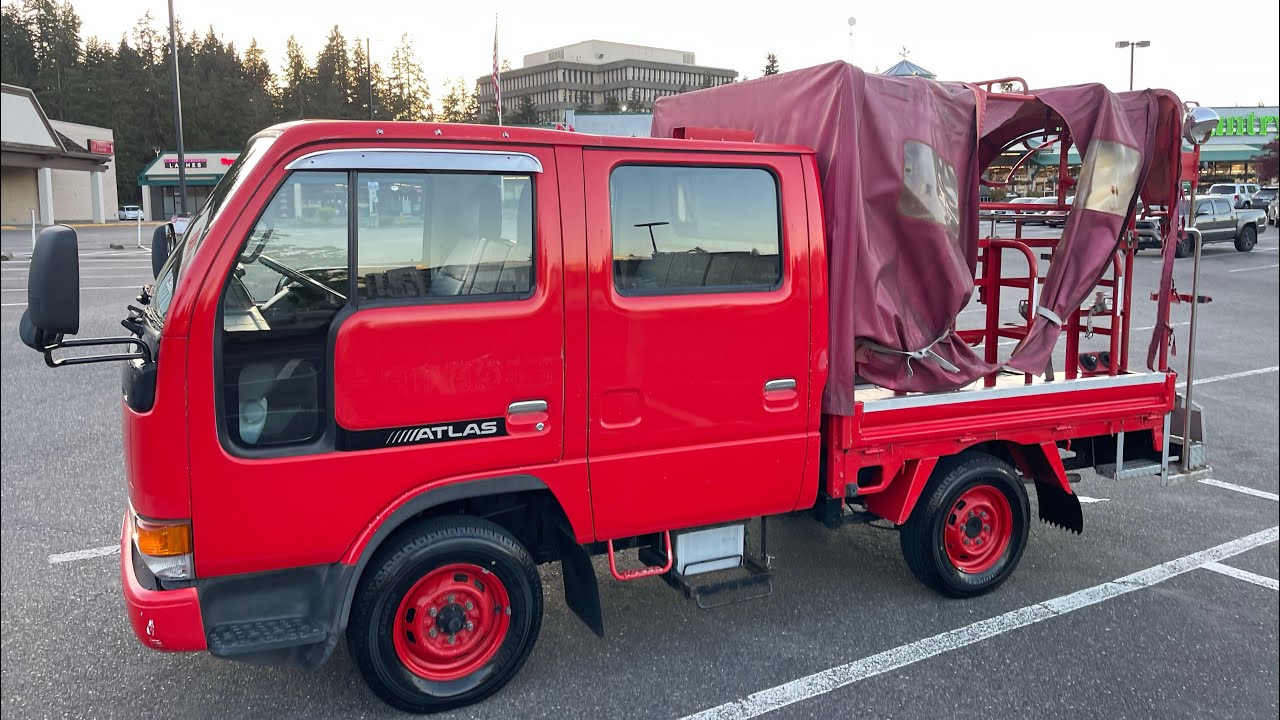 Sold: 1995 Nissan Atlas W-Cab fire truck 4WD  MT5 TD25 diesel has AC PC 14,459mi USA