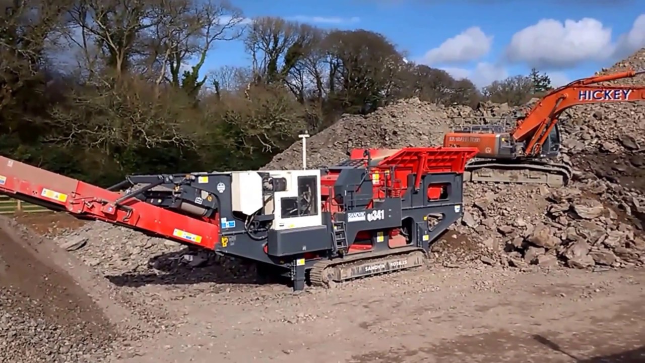 Sandvik mobile crushing plant working on a road construction site