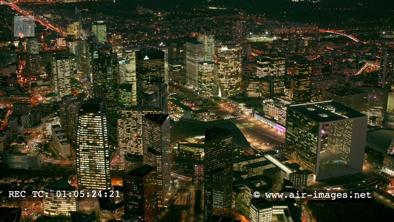 Aerial footage by night - The business district of Paris La Defense