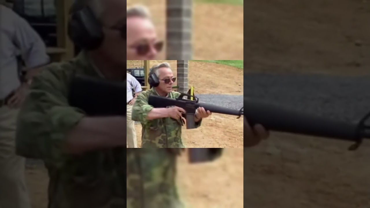 Eugene Stoner and Mikhail Kalashnikov testing each other's guns!