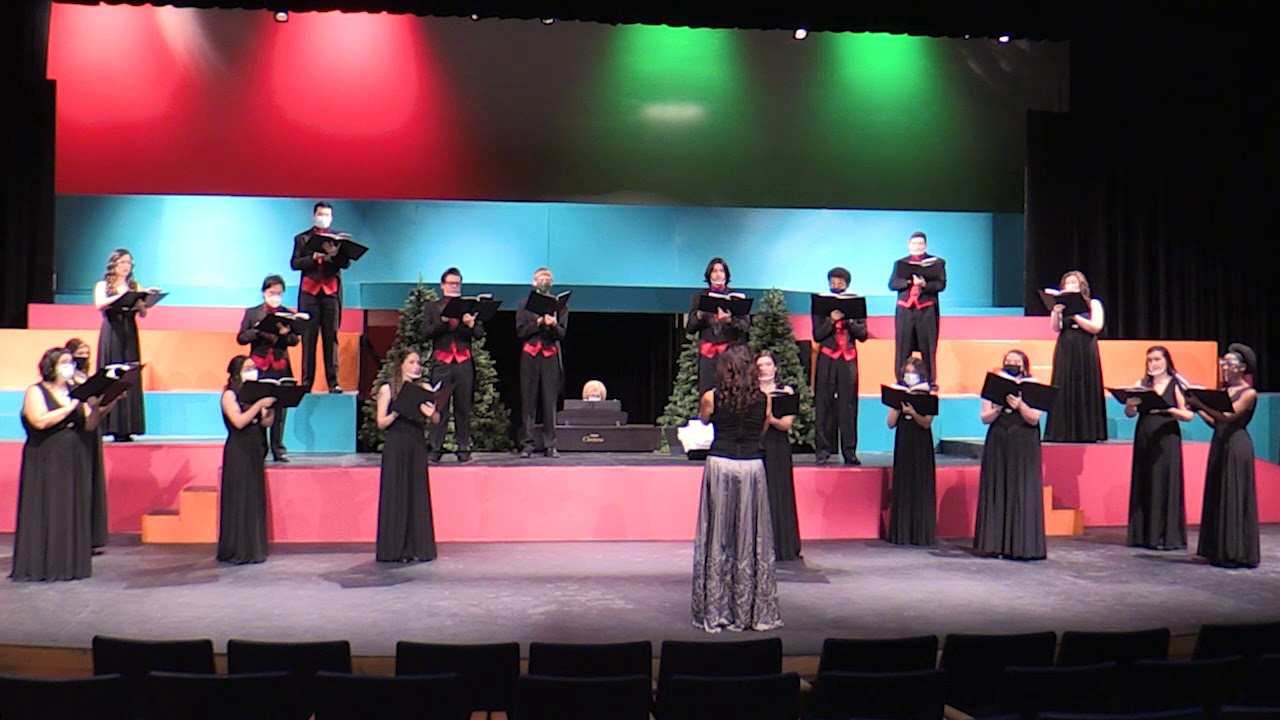 The Newman University Chorale performs, 