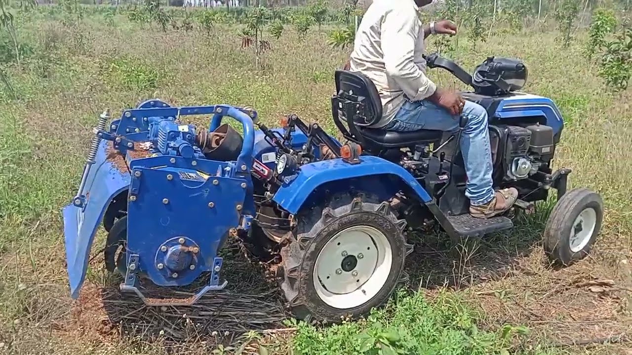 swaraj code mini 12hp tractor demo in mango garden, rotavator performance,