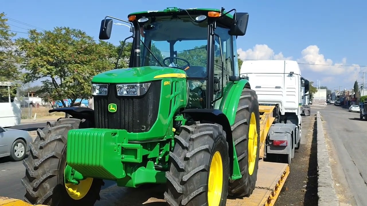 Recibiendo un nuevo tractor John Deere 6125E.