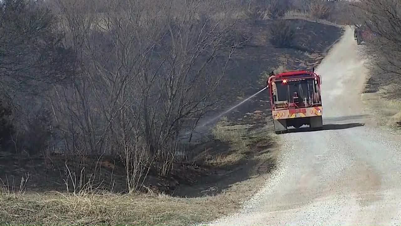 RAW VIDEO: Crews contain Logan County grass fire amid high fire danger day