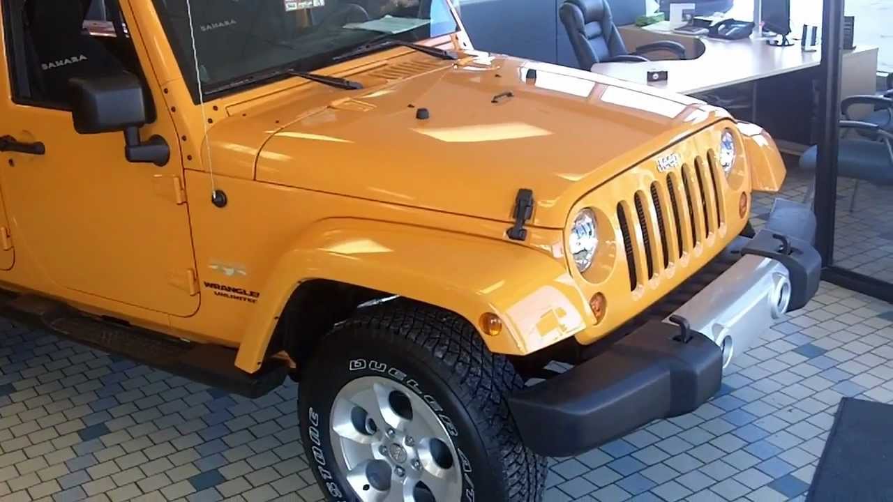 2013 Jeep Wrangler Unlimited Sahara Orange Dozer