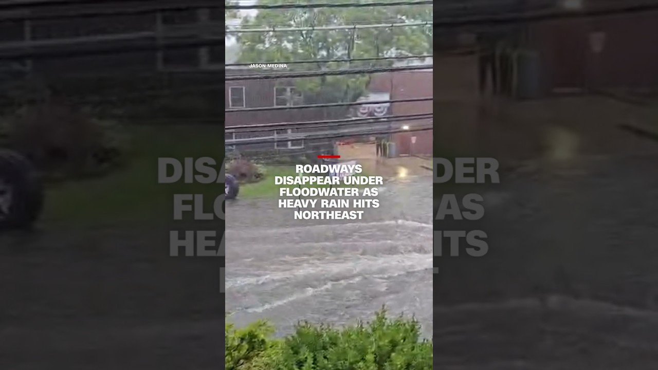 Roadways disappear under floodwater as heavy rain hits northeast