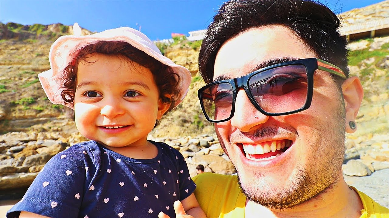 LEVEI MINHA FILHA EMMA NA PRAIA POR PRIMEIRA VEZ