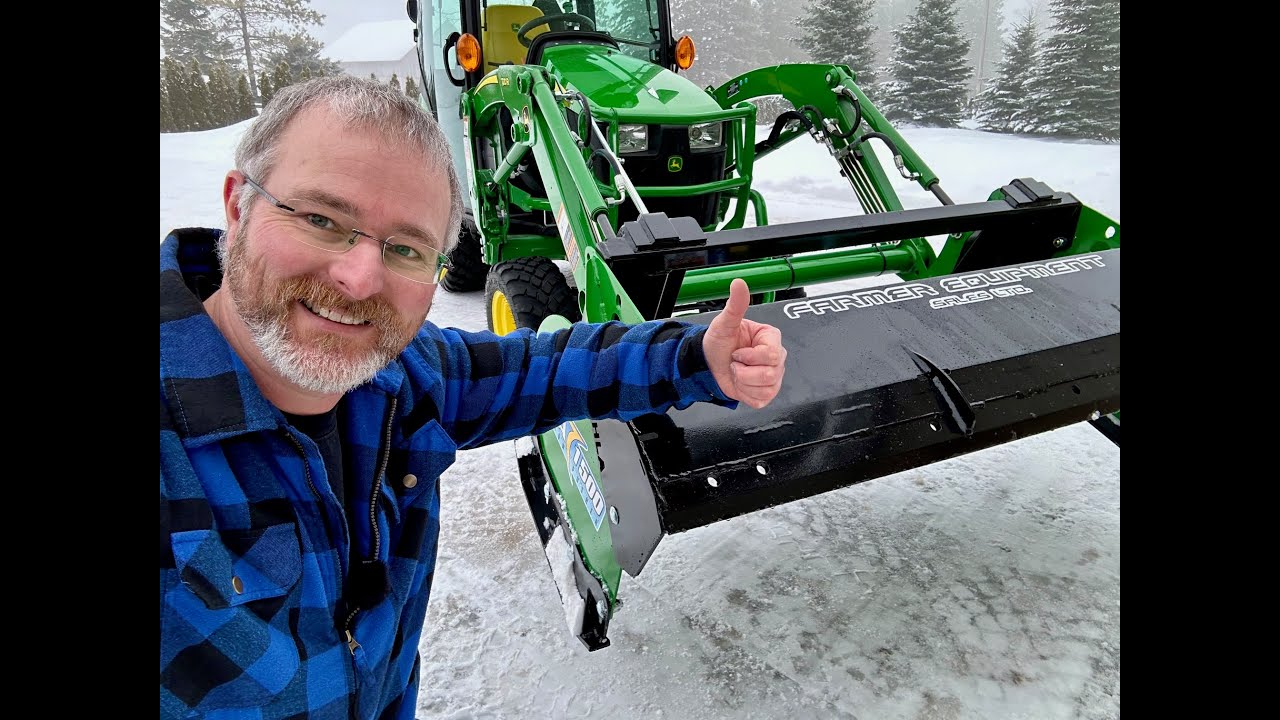 Testing out the HLA 1500 series snow pusher on a John Deere 2025r