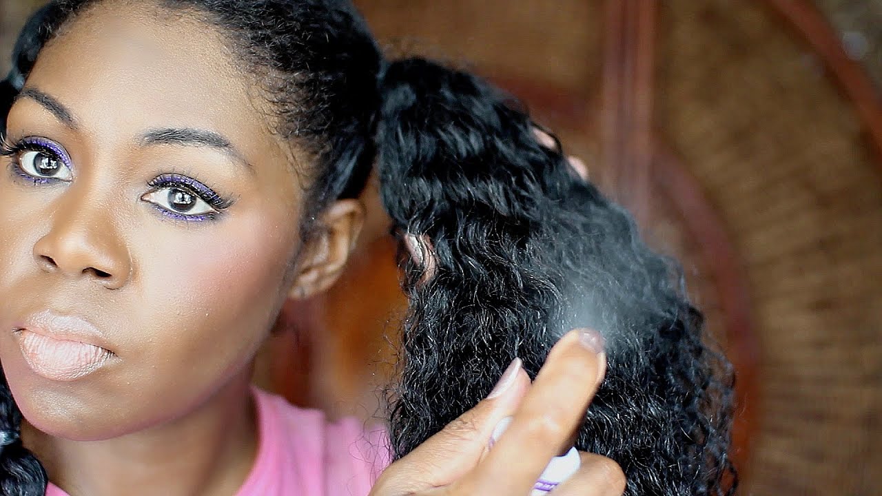 My hair is currently co-washed, deep conditioned, heatless, stretched air dried (carols daughter)