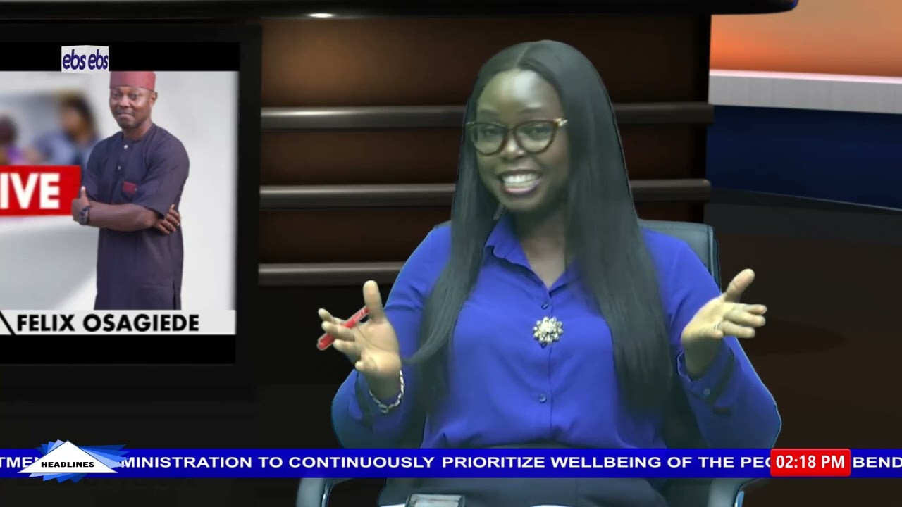 With the Director, Public Relations, Edo State Health Insurance Commission.