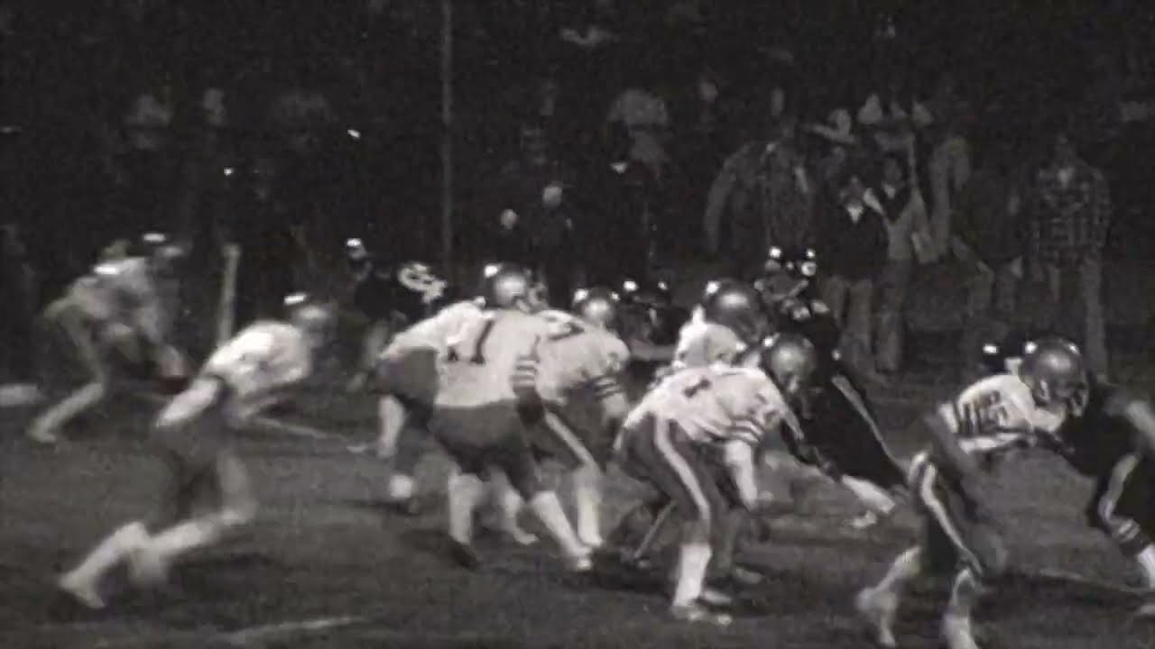 1978 ECR Football. John Mazur (No. 11) hits Steve Graham (No. 22) for a 20-yard gain