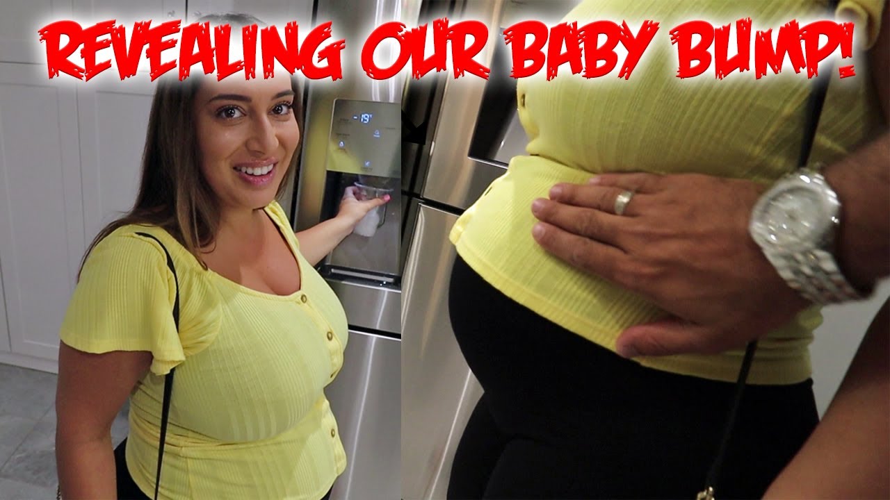 REVEALING HER BABY BUMP!
