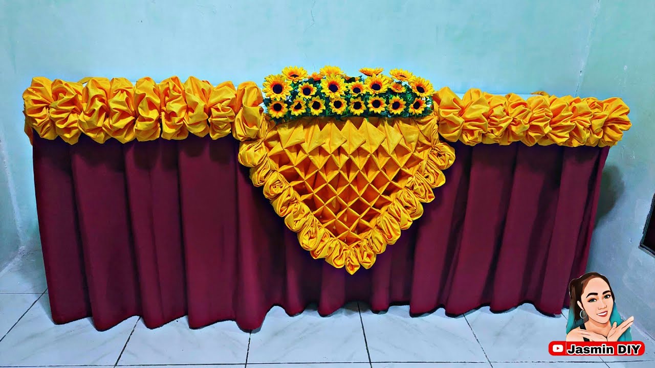 Diamond with Rose Fold on Top and SUN Flowers Table Skirting Design Ideas