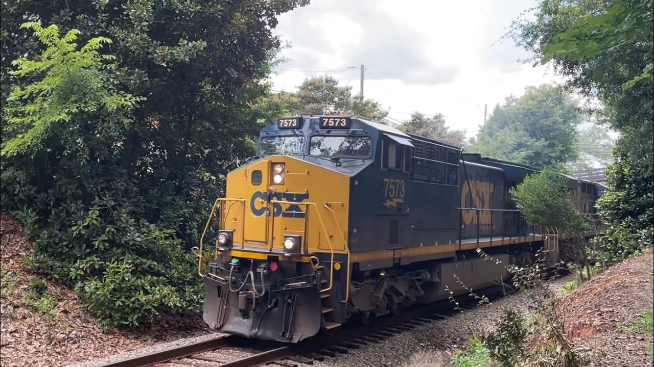 CSX 7573 leads a large C410 7-29-2025