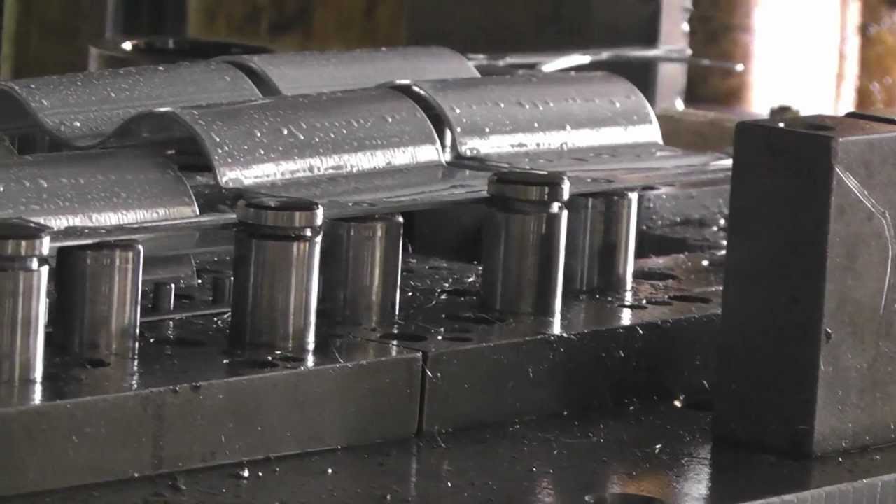 progressive tool; pole clamp stamping