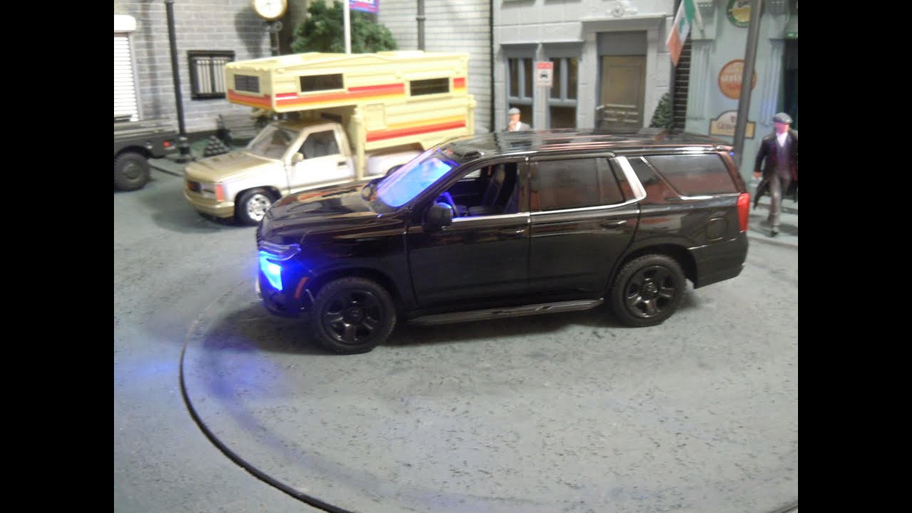 Unmarked Police 1/24 scale Chevy Tahoe with lights. No light loss from behind LEDs.
