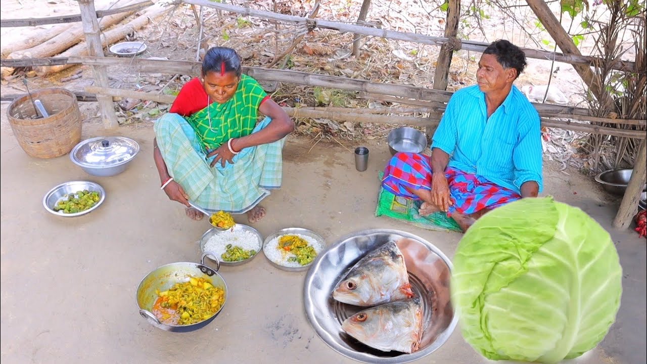 Tasty cabbage curry with Hilsha fish head recipe cooking and eating by santali tribe couple