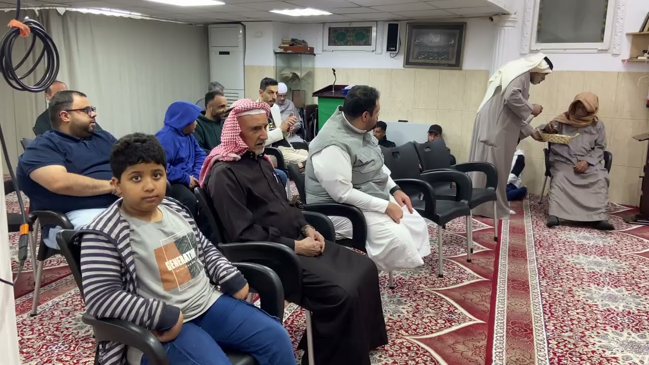 ٢٣