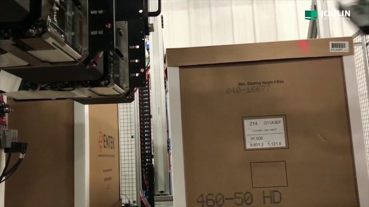 Gluing adhesive labels on cartons with small vacuum gripper