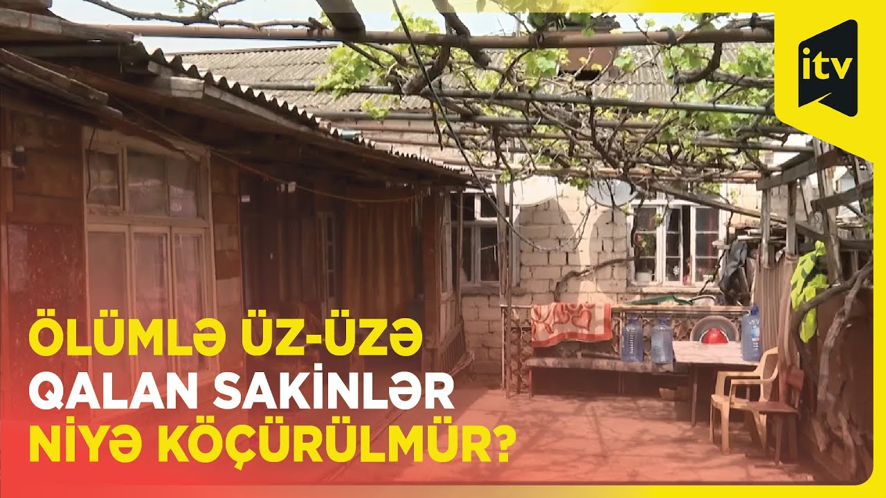 Dəmir yolu relslərinin iki addımlığında yaşayan sakinlər