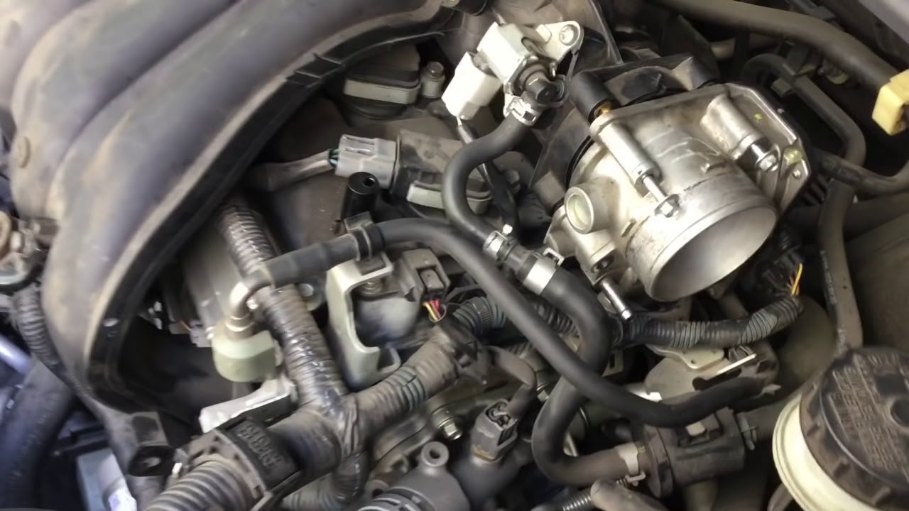 Cambio de bujías Nissan Sentra 2009