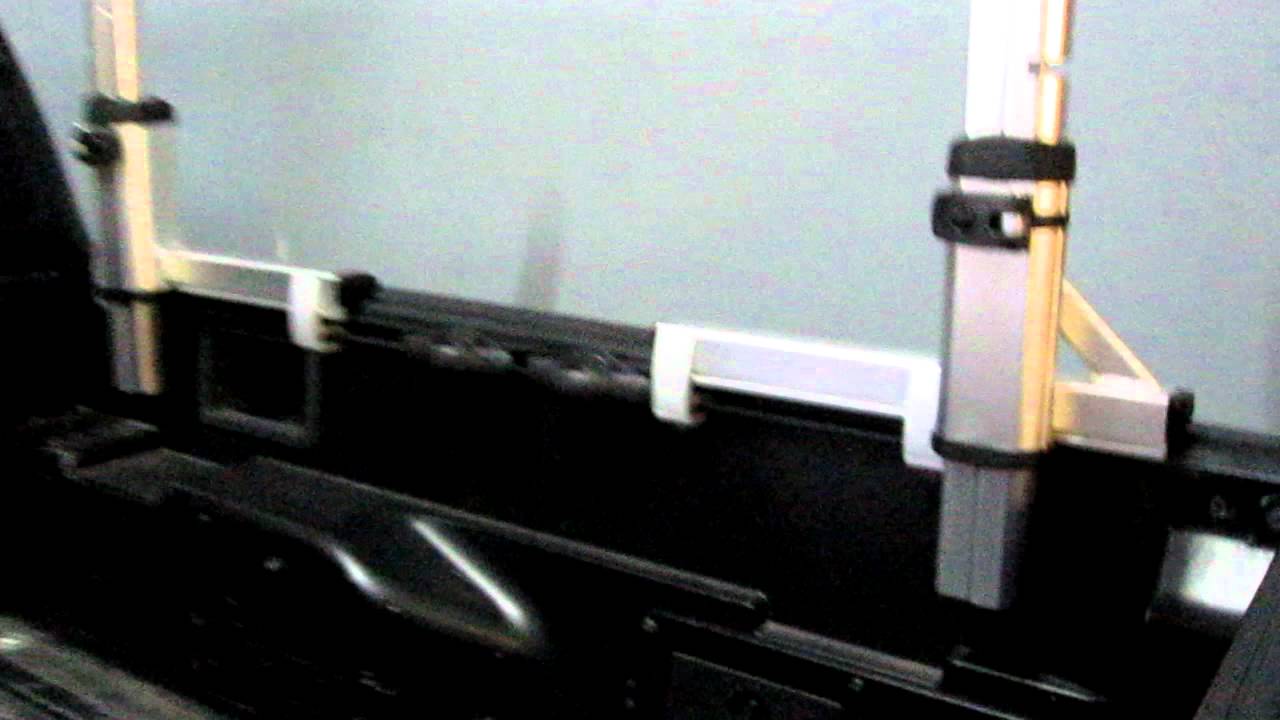 2010 Toyota Tacoma with Thule Xsporter Truck Rack by Rack Outfitters