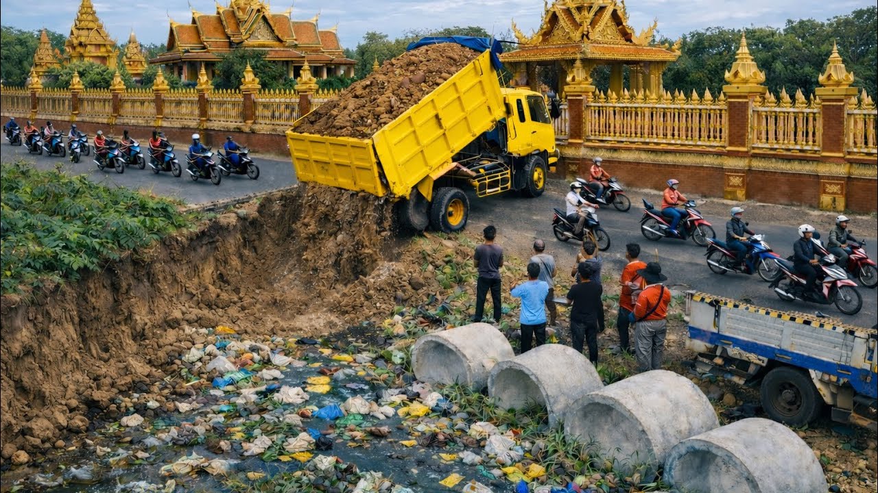 Start Opening New Project!!Bulldozer KOMAT'SU D20P pushing Soil into flooded​ & Trucks 5Ton.