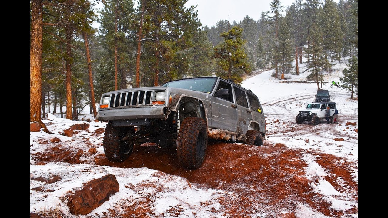 XJ on 33s no lift! takes on RainbowFalls in Snow!