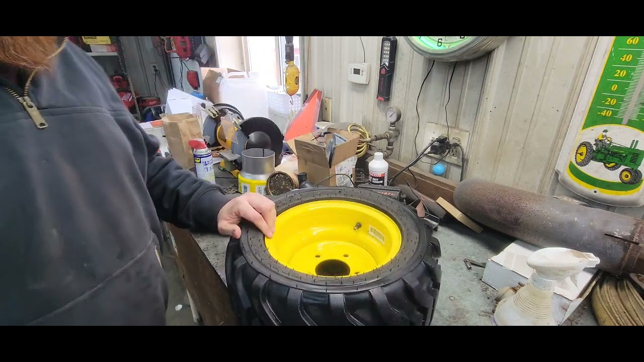 John Deere 1025R Tire Repair Muddy Day Shop Work