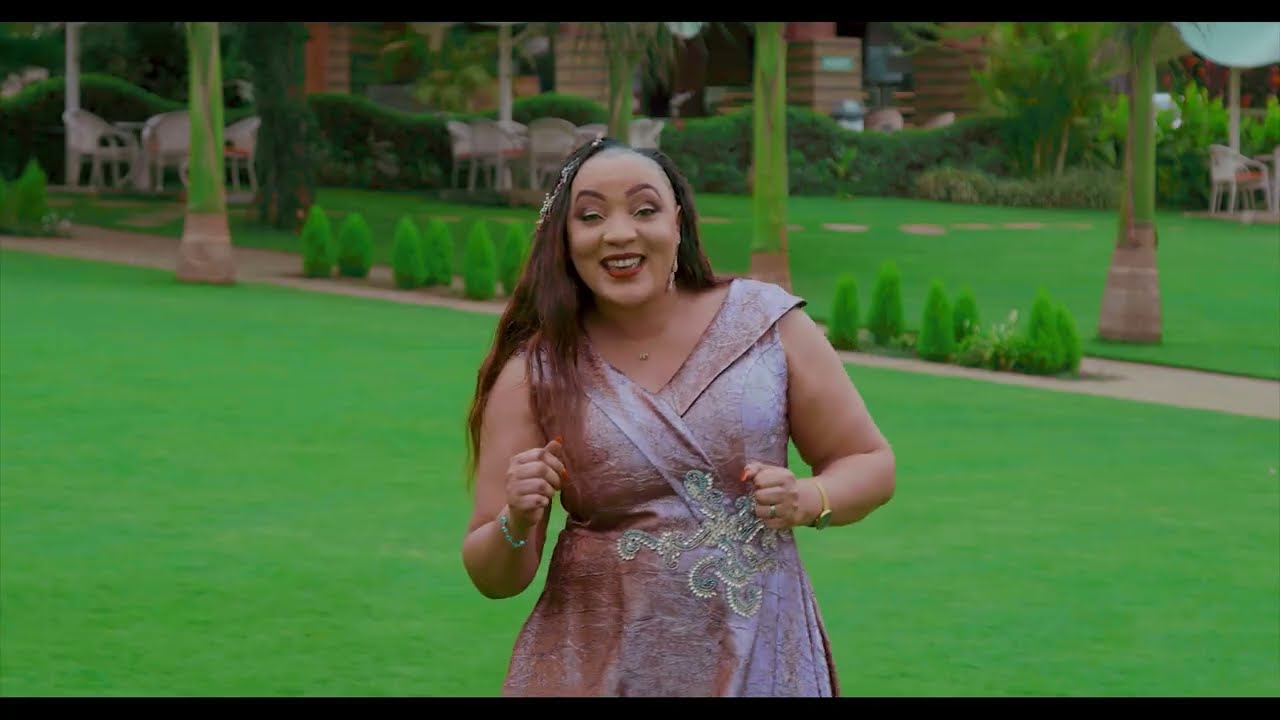 MAGGIE JOMO MUGO - JESU WANDIKE THI   ( to Set Skiza, dial  5968511 send to 811)