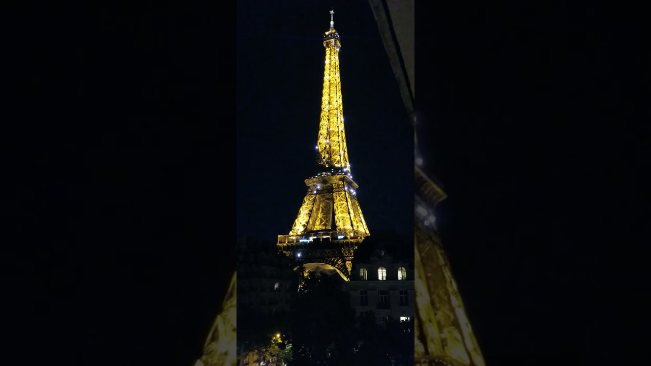 The Eiffel Tower at night from our balcony at the Pullman - Filmed 7-19-23
