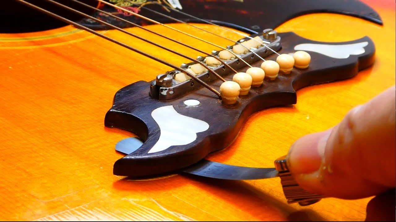 Gibson Dove and Yamaha frets