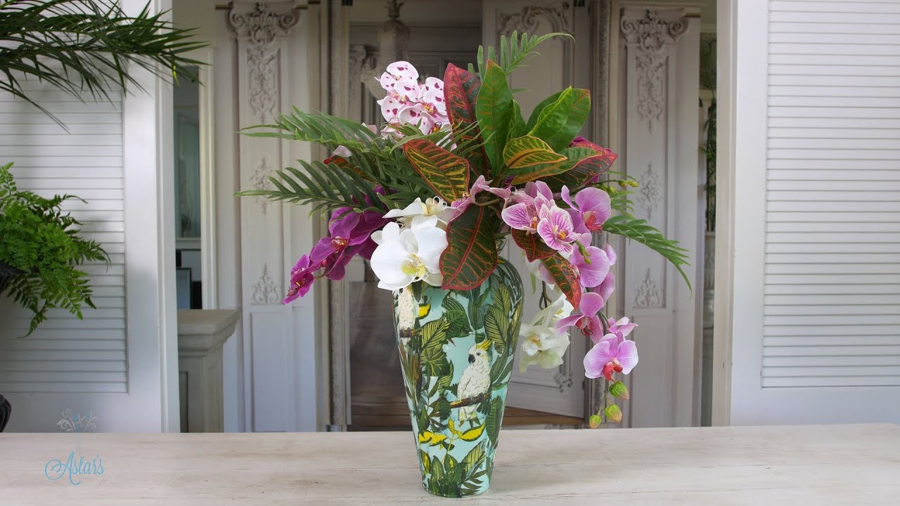 Tropical orchids into a decoupage pot