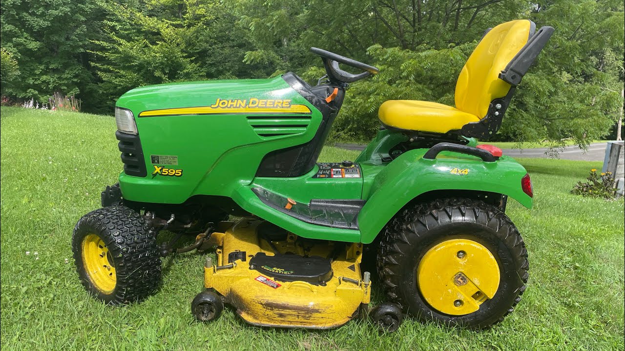 Adding rear wheel weights to my wife’s John Deere X595.
