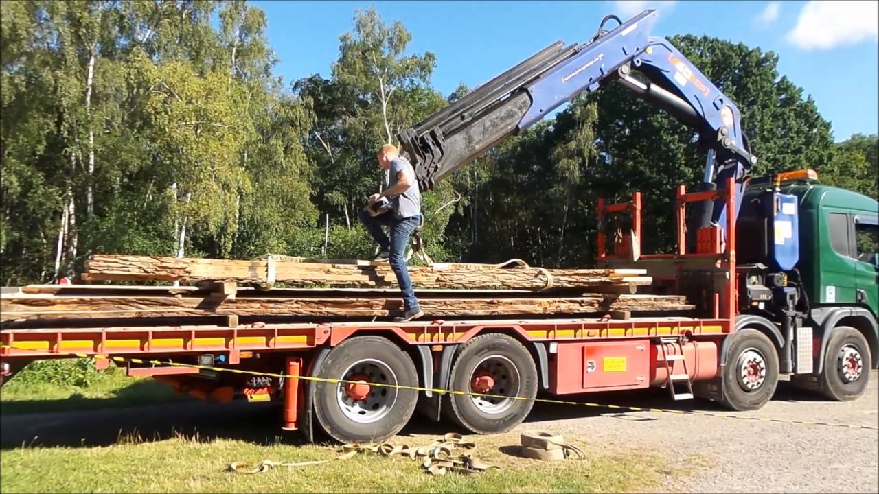 Loading narrowboat Renfrew with wood for butty Lucy 06/08/16
