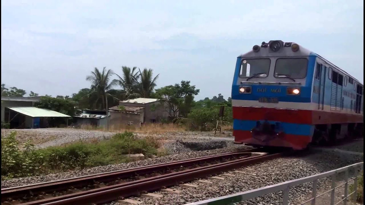 Locomotives & trains run through Nam O bridge