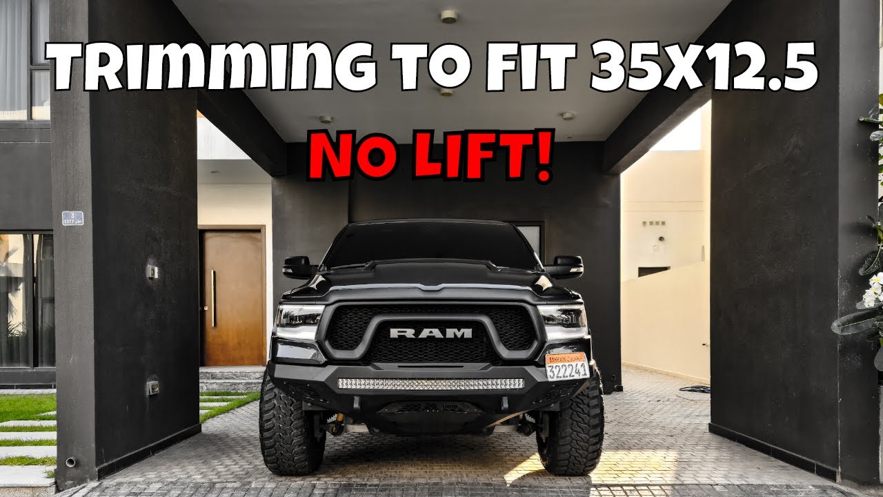 Ram 1500 Rebel 20x12 wheels on 35 inch mud tires no lift kit
