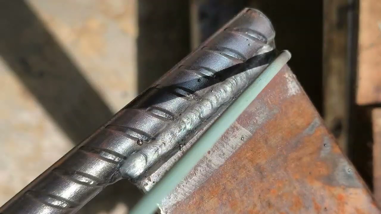 professional welding technique of combining 2 different shaped iron rods with a technique 