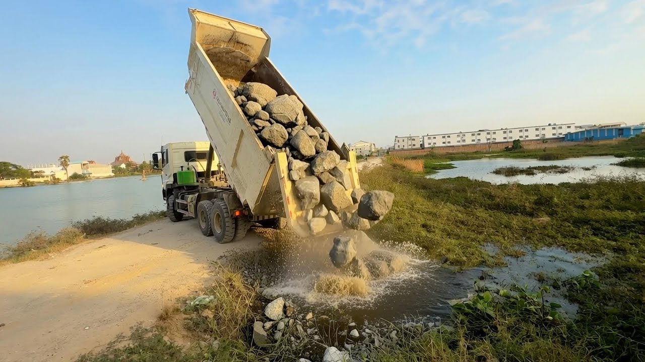 Just Starting Stones Filling Land Size 50m x 50m With 5ton, 18ton Trucks & Shantui Dozer Processing