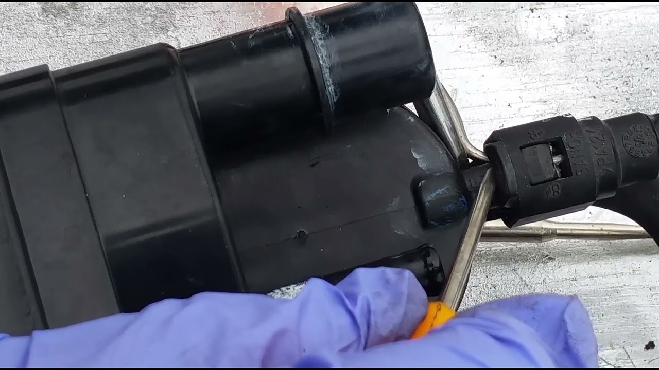How to unplug a Toyota charcoal canister vapor hose connections