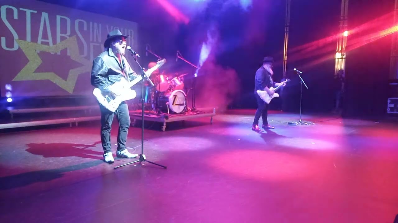 Performing as ZZ Top at 