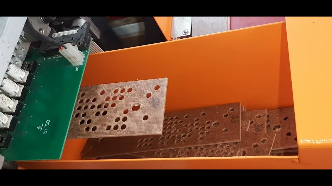 CAD design textiles computerised jacquard card punching machine. 