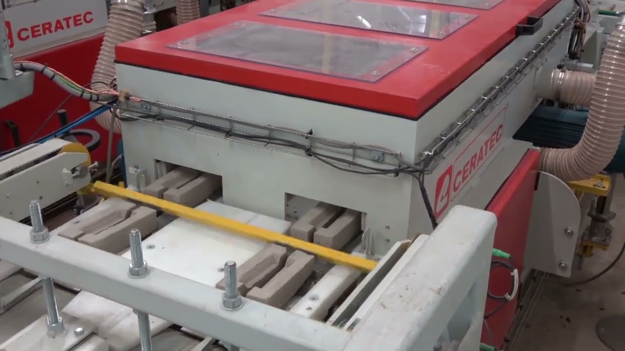 A fully automated prefab wall facility for facing brick elements